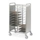 Carrello portavassoi universale con pannelli bianchi laterali. Capacità 20 vassoi  (interasse cm.11h). Struttura in acciaio inox. Guide in filo di acciaio cromato. Ruote piroettanti Ø125mm, 2 con freno. Con paracolpi.
